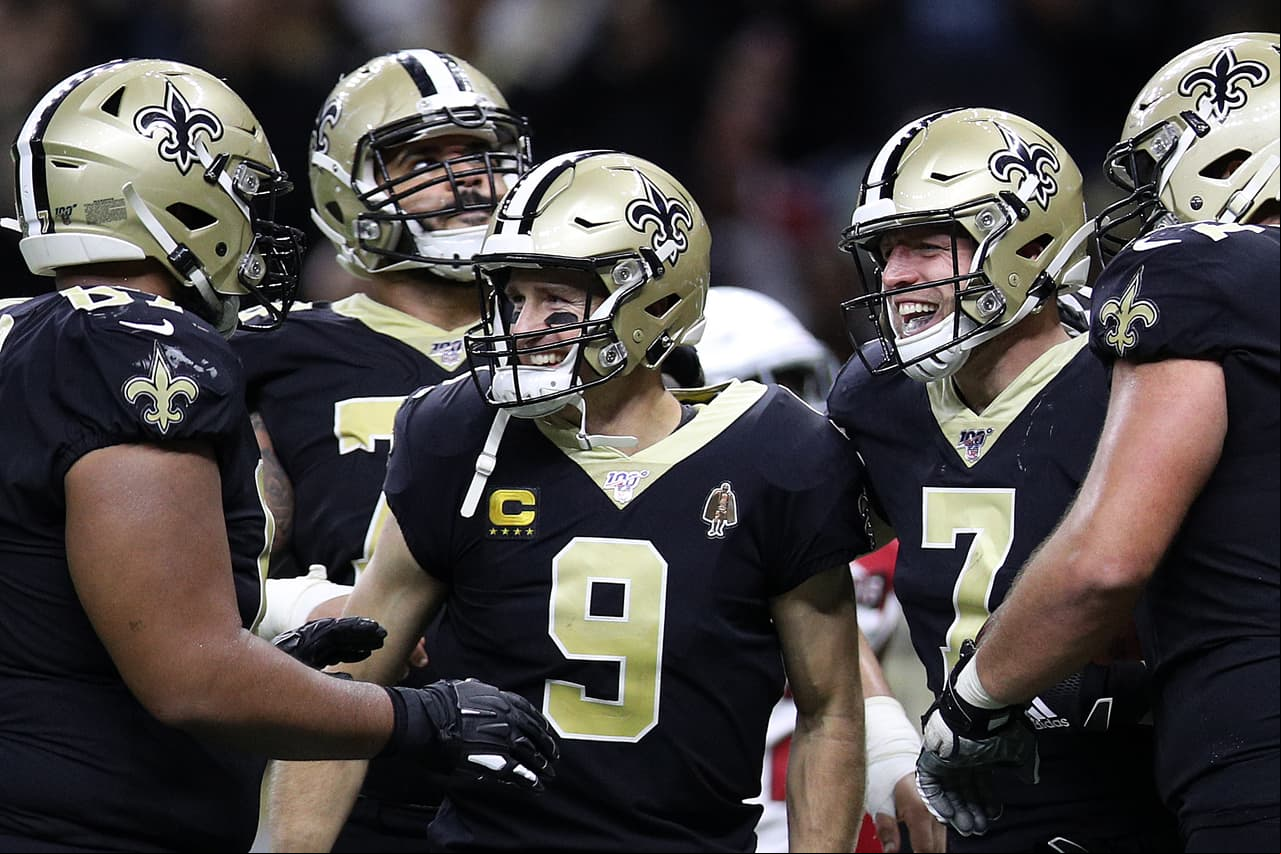 NEW ORLEANS, LOUISIANA - OCTOBER 27: Drew Brees #9 of the New Orleans Saints and Taysom Hill #7 of the New Orleans Saints celebrate a touchdown against the Arizona Cardinals at Mercedes Benz Superdome on October 27, 2019 in New Orleans, Louisiana. (Photo by Chris Graythen/Getty Images)