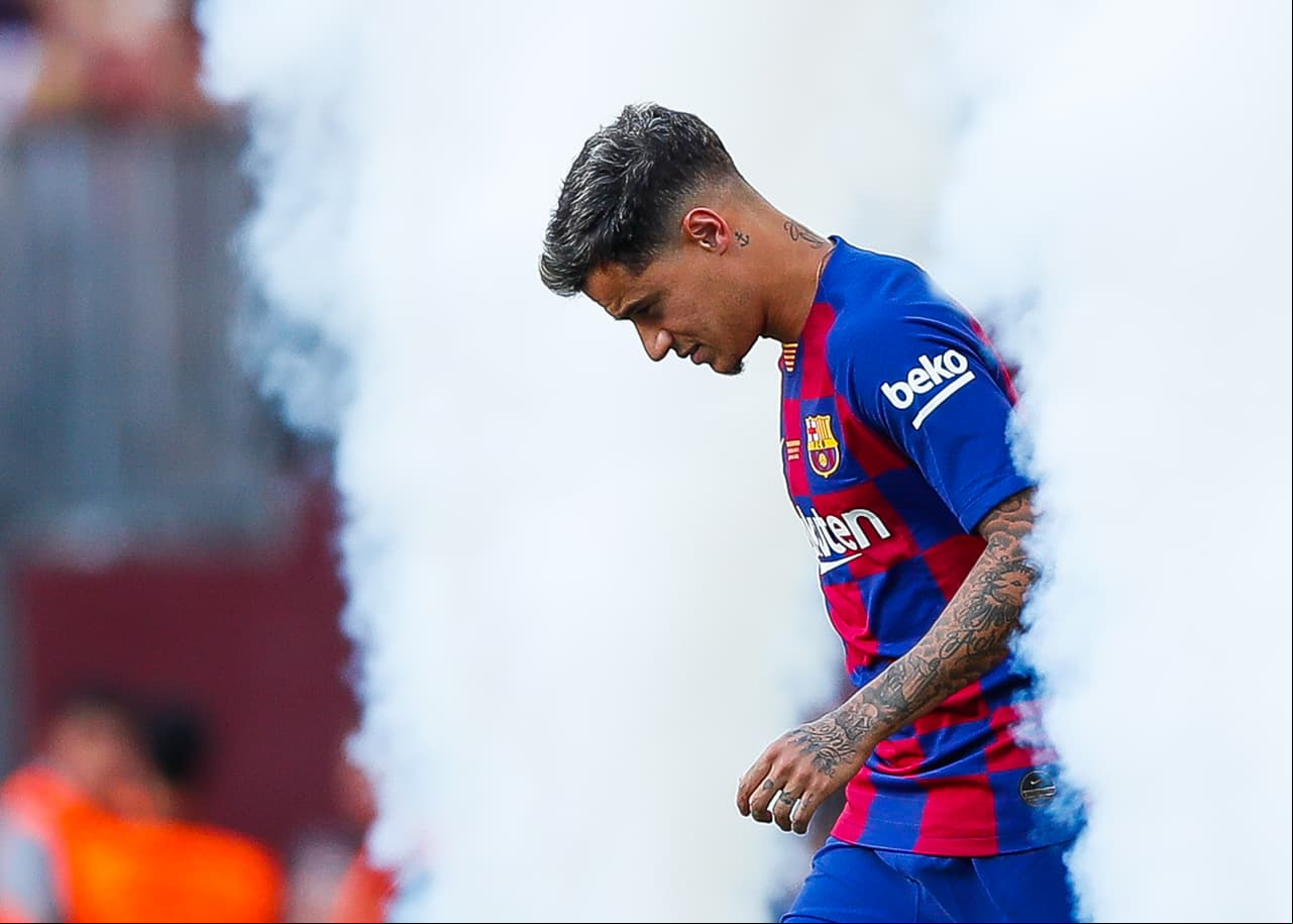 BARCELONA, SPAIN - AUGUST 04: Philippe Coutinho of FC Barcelona waves to ers ahead of the match between FC Barcelona and Arsenal at Nou Camp on August 04, 2019 in Barcelona, Spain. (Photo by Eric Alonso/MB Media/Getty Images)